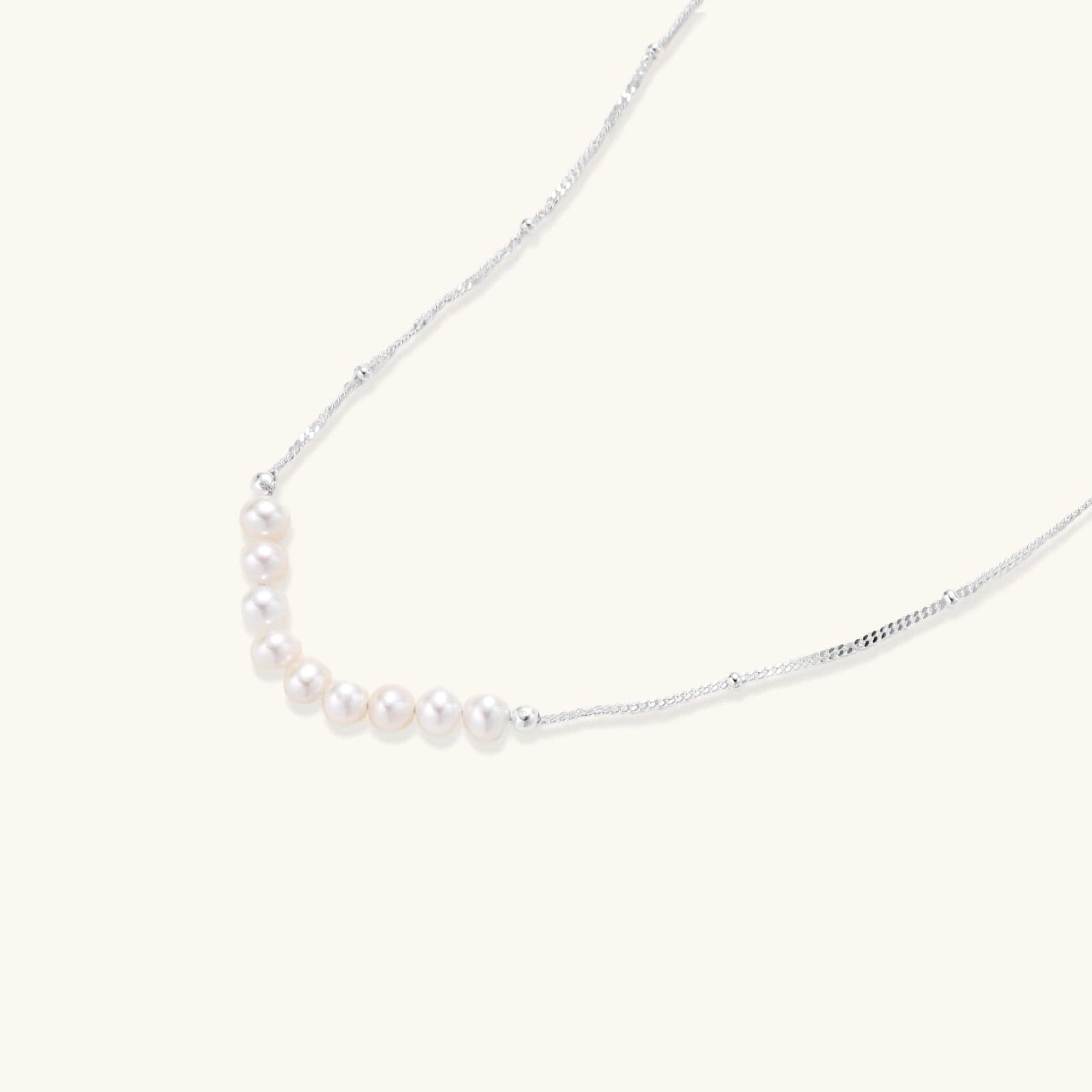 Luna Pearl Arc Necklace — a closer look at the design